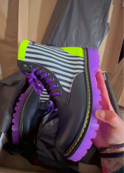 Waterproof boots in clashing colors
